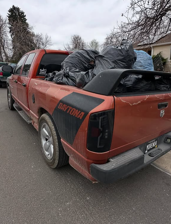 Truck loaded with bagged junk